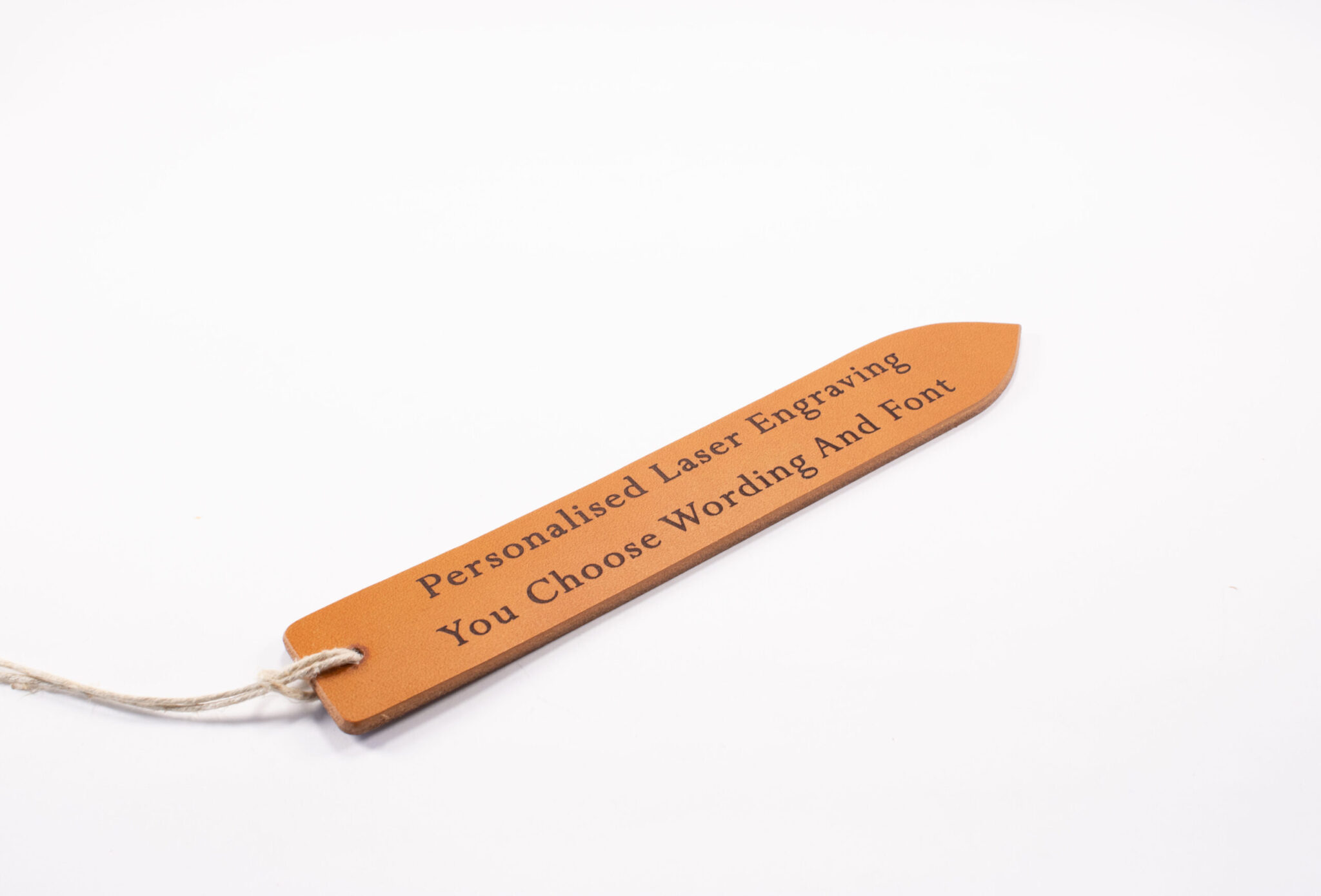 Laser engraved leather bookmark made from Full-grain European Leather made in Sweden tanned in Italy. Choose your own font and text size for a custom bookmark in European leather