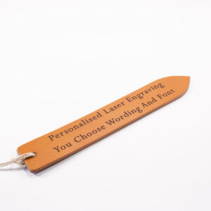 Laser engraved leather bookmark made from Full-grain European Leather made in Sweden tanned in Italy. Choose your own font and text size for a custom bookmark in European leather