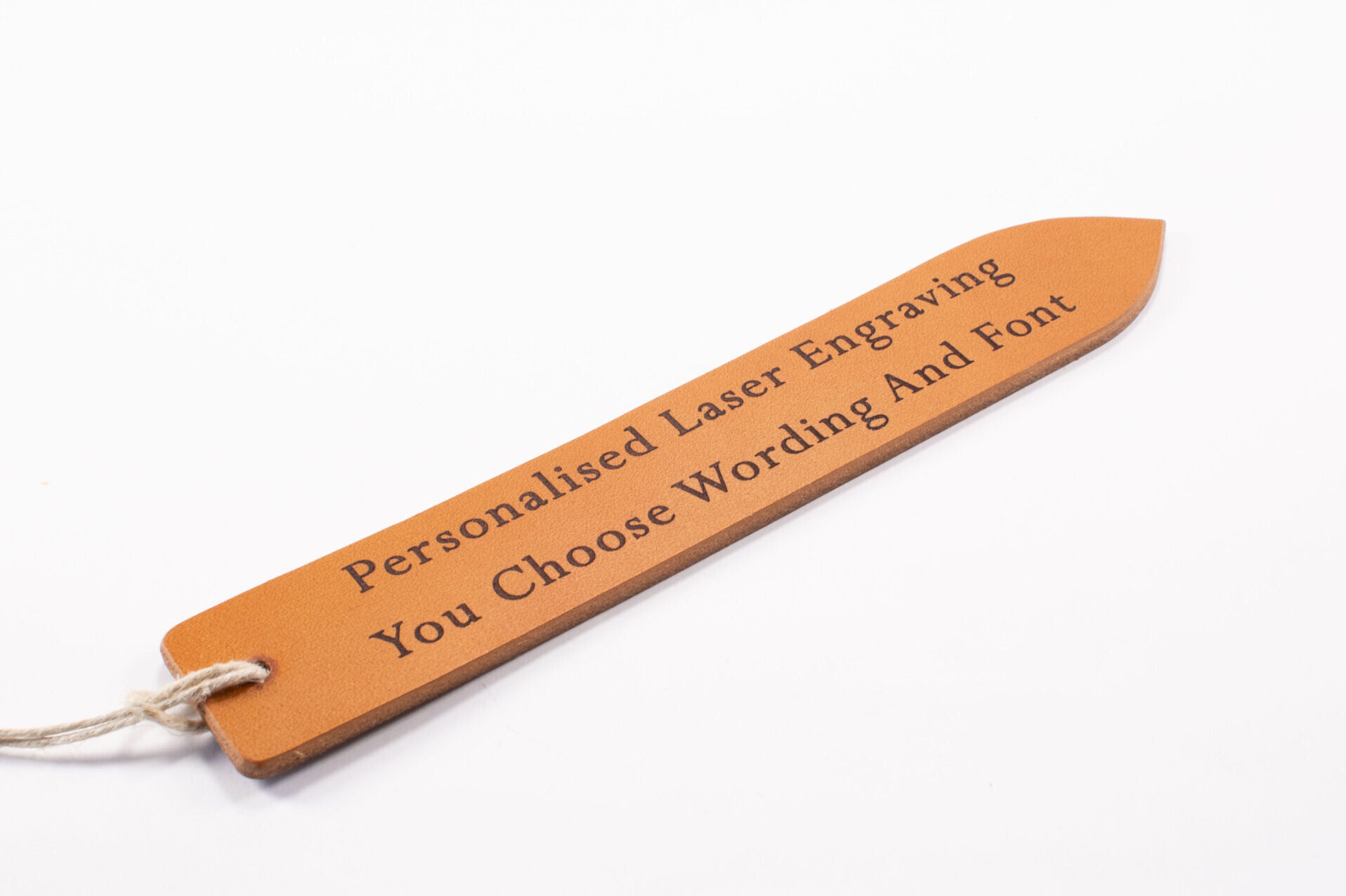 Laser engraved leather bookmark made from Full-grain European Leather made in Sweden tanned in Italy. Choose your own font and text size for a custom bookmark in European leather