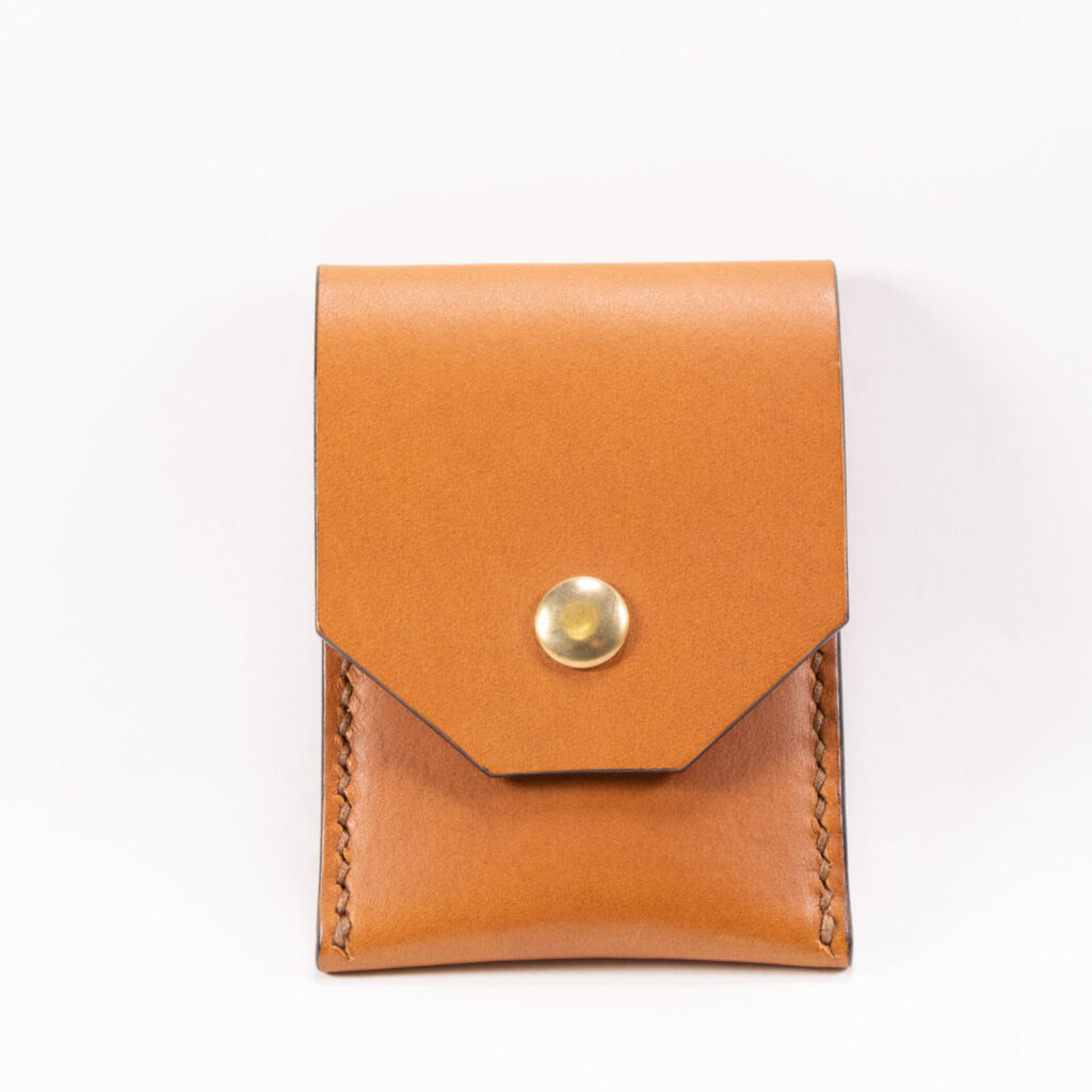 Tinier Pouch - Slim pocket card wallets Handmade from European Leather. 4-8 card wallets made from Vegetable-tanned leather available in cognac color. Sizes 70 mm & 80mm wallet leather made in Sweden.