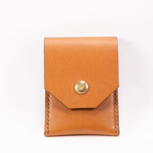 Tinier Pouch - Slim pocket card wallets Handmade from European Leather. 4-8 card wallets made from Vegetable-tanned leather available in cognac color. Sizes 70 mm & 80mm wallet leather made in Sweden.