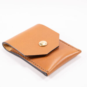 Tinier Pouch - Slim pocket card wallets Handmade from European Leather. 4-8 card wallets made from Vegetable-tanned leather available in cognac color. Sizes 70 mm & 80mm wallet leather made in Sweden.