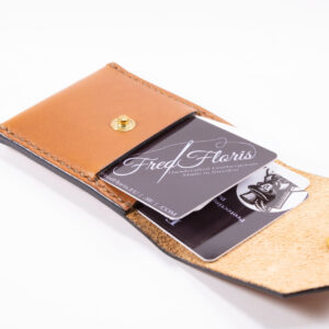 Tinier Pouch - Slim pocket card wallets Handmade from European Leather. 4-8 card wallets made from Vegetable-tanned leather available in cognac color. Sizes 70 mm & 80mm wallet leather made in Sweden.