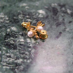 Product image of FredFloris small stud gold plated silver pearl earrings