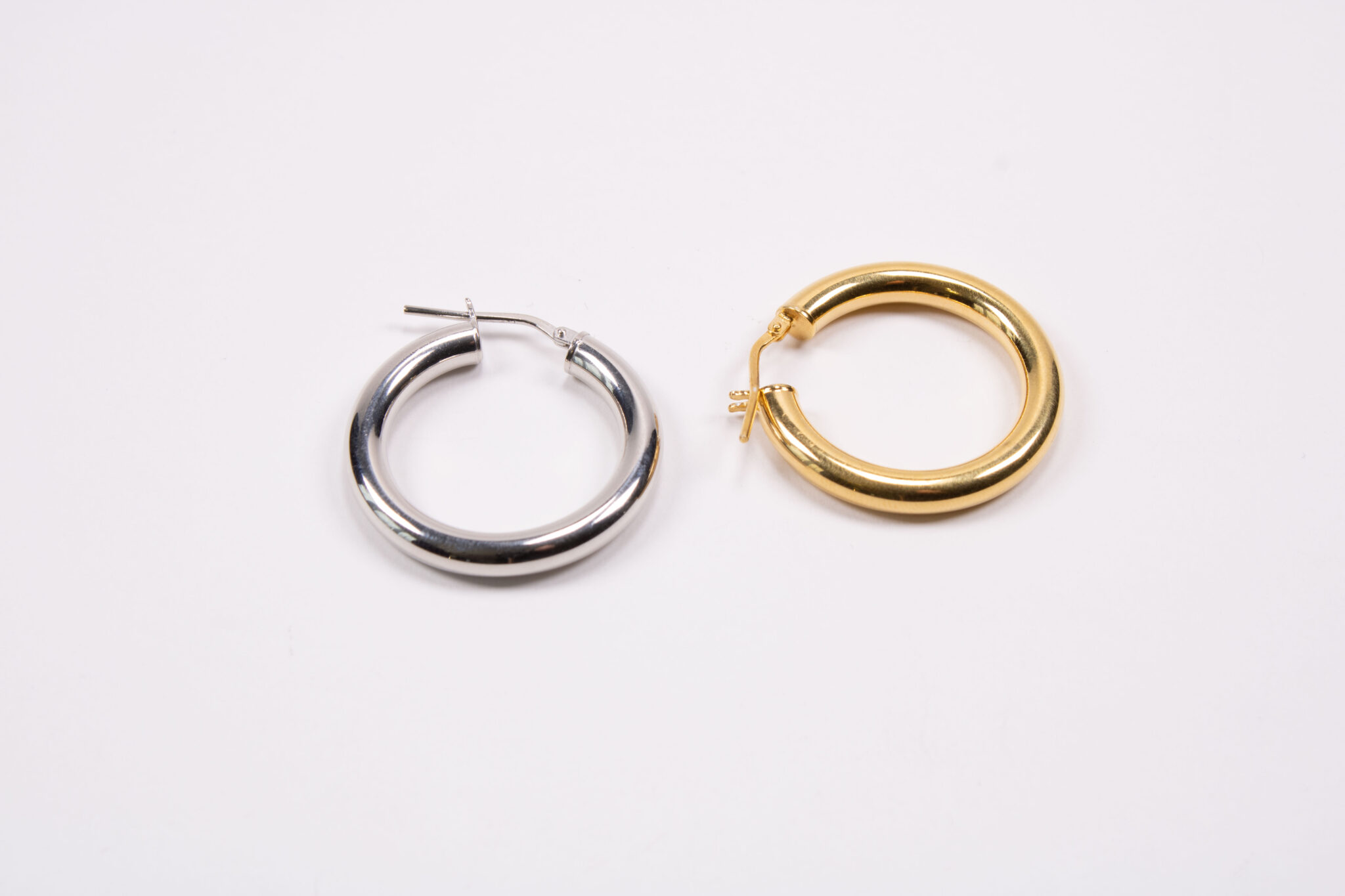 Product image of FredFloris thick & chunky, gold & platinum plated silver hoop earrings