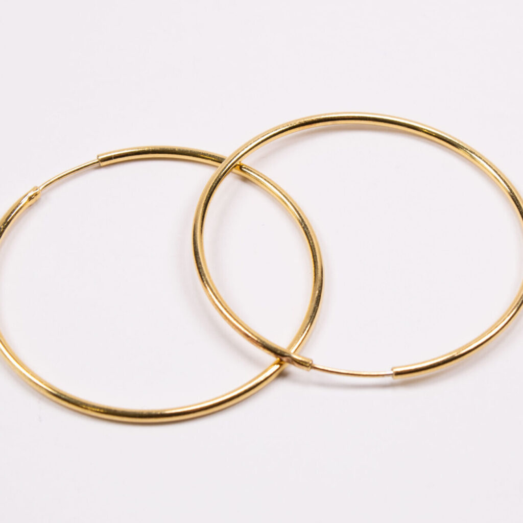 Product image of FredFloris large round hoop gold and silver earrings