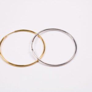 Product image of FredFloris large round hoop gold and silver earrings