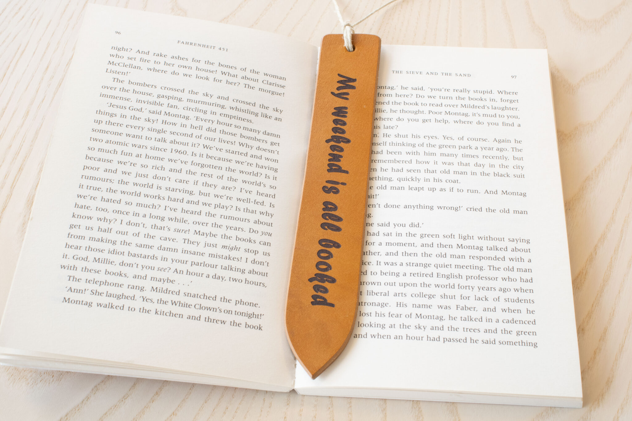 Laser engraved leather bookmark made from Full-grain European Leather made in Sweden tanned in Italy. Choose your own font and text size for a custom bookmark