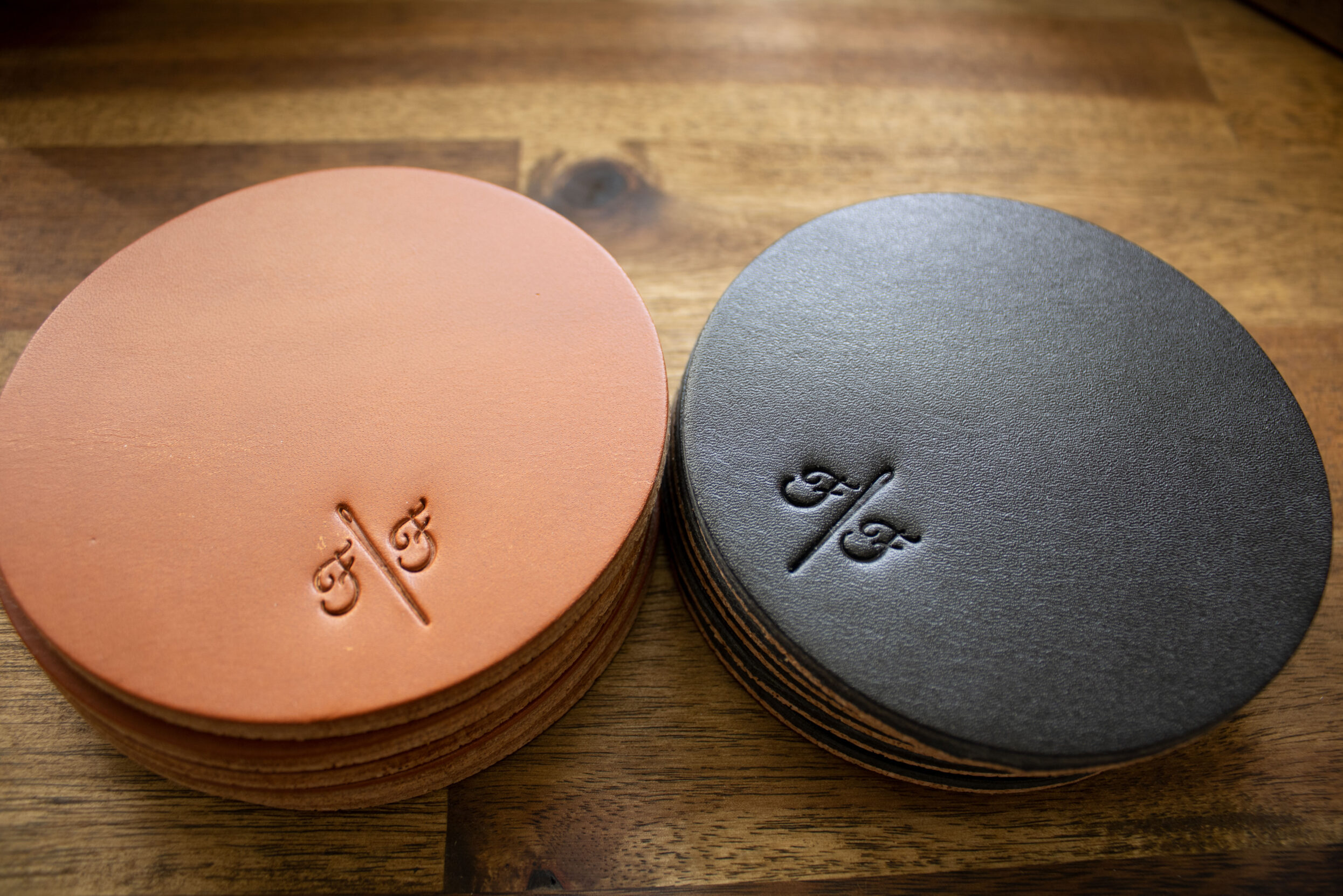 Product image of FredFloris Black & Brown leather drink coasters
